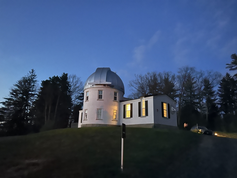 Exterior shot of Shattuck Observatory at dusk in the spring