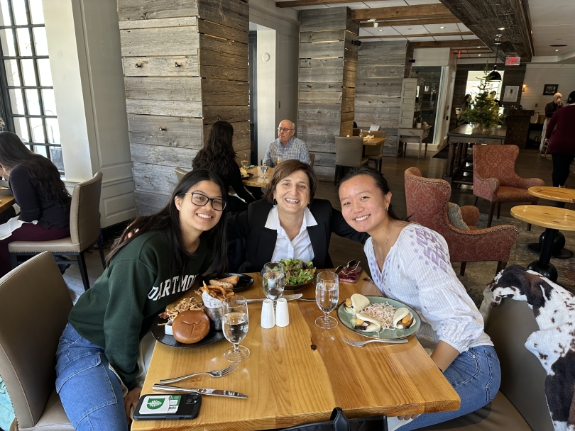 Sydney '24, Diana '23, and Professor Olivetti enjoying a meal at Pine Restaurant