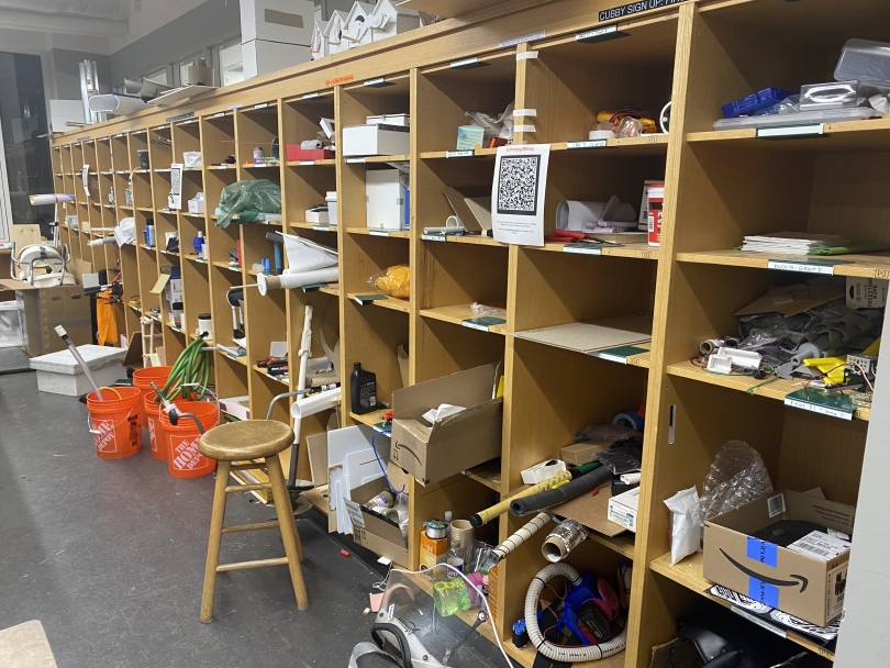 A view of project cubbies stuffed with materials for engineering projects in couch lab, a prototyping space at Thayer.