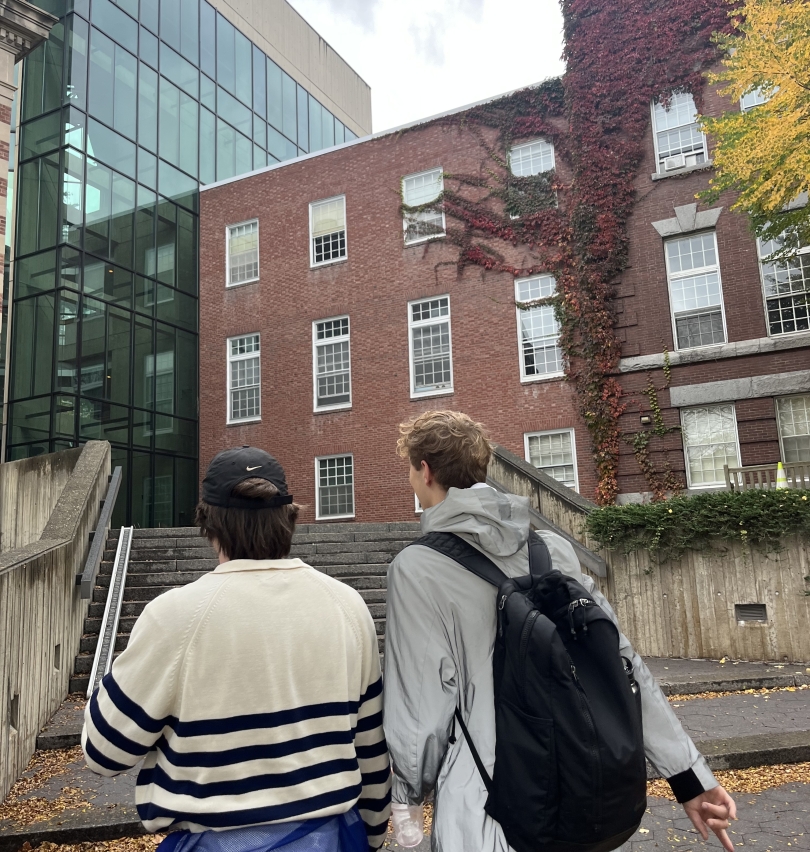 martin and his friend emerson walking in front of the Fairchild building