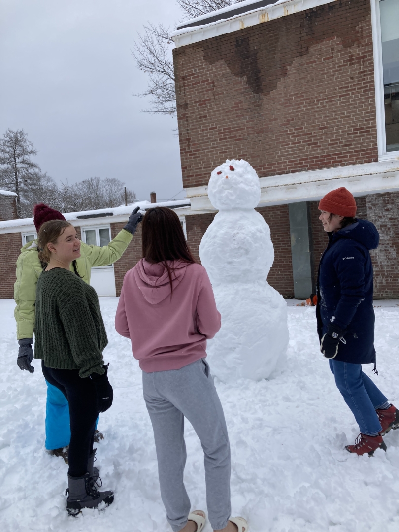 Students building a snowman!