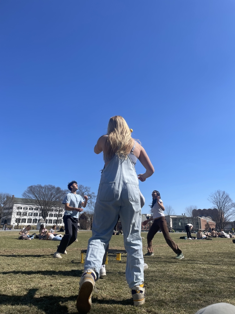 Playing Spikeball on the Green