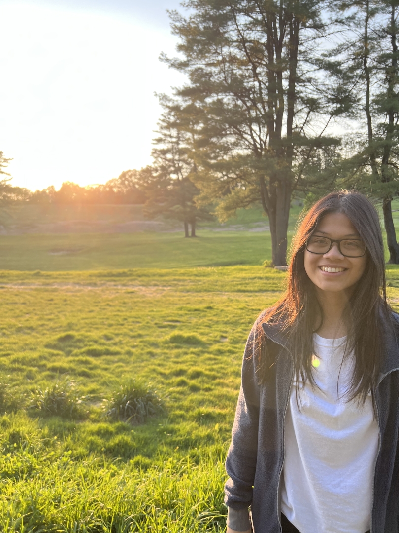 Diana enjoying the golden sunlight on a Pine Park trail