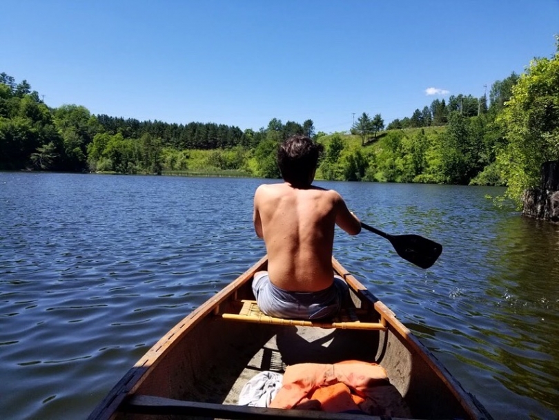 Paddling Along Simon on River