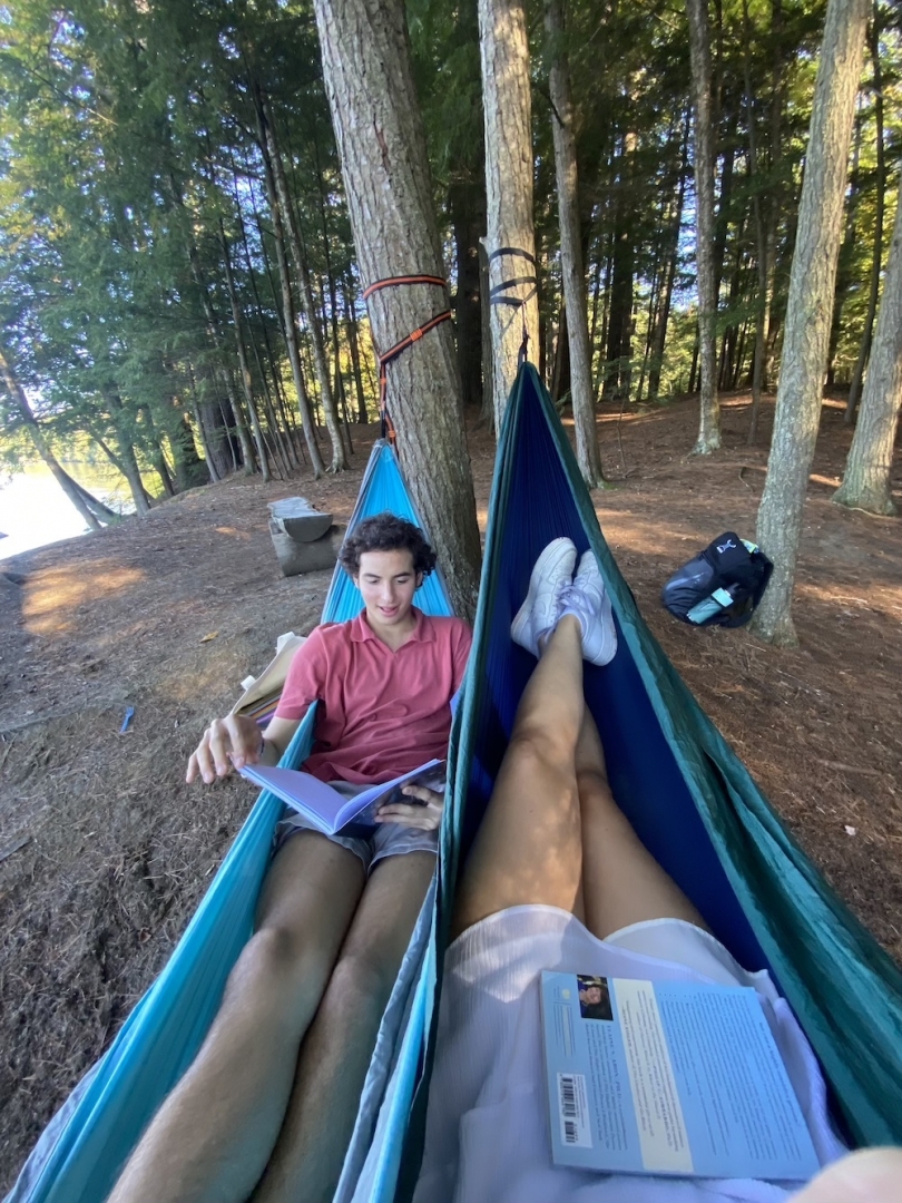 A picture of me in my hammock doing work.