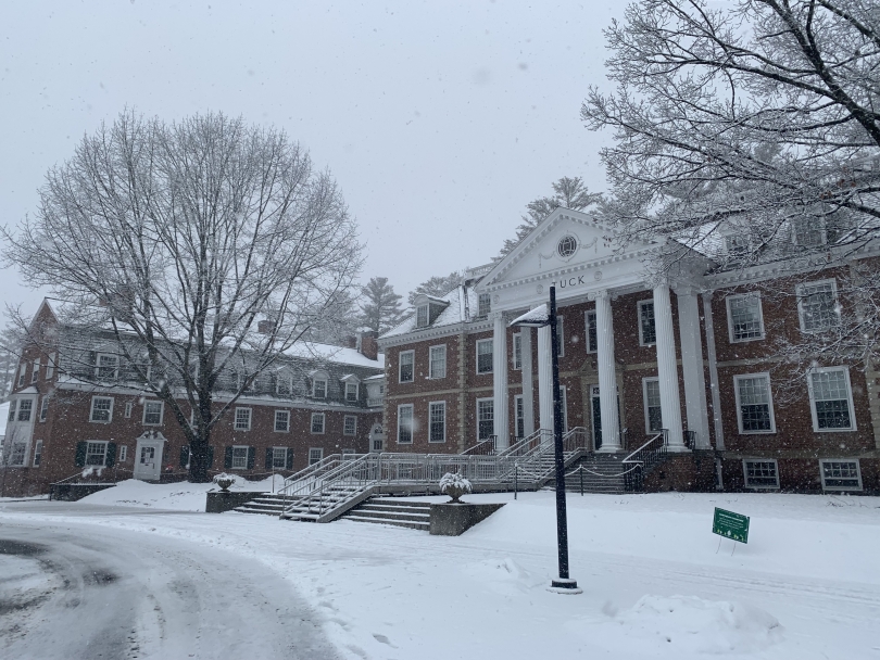 Dartmouth's emblematic business school building, covered in snow