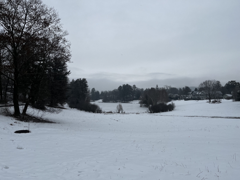 an image of Occom Pond covered in snow