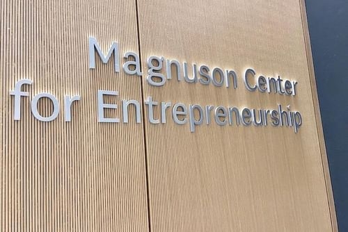Wood sign for the Magnuson Center