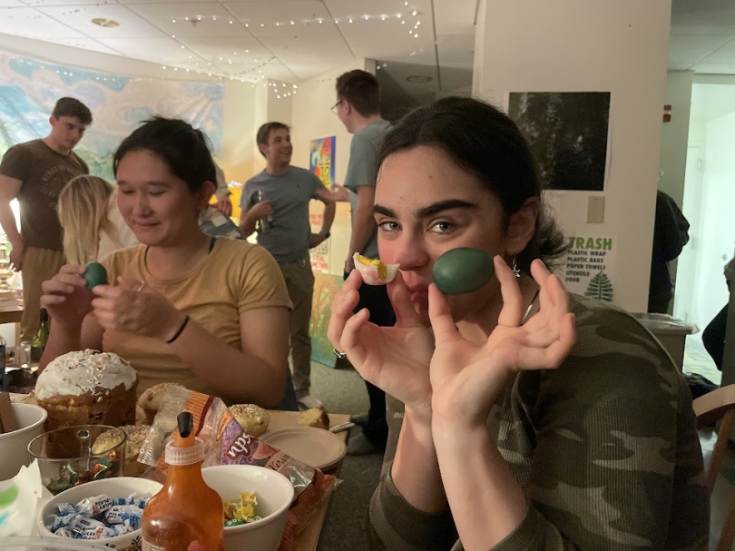 A picture of Naniko holding two eggs 