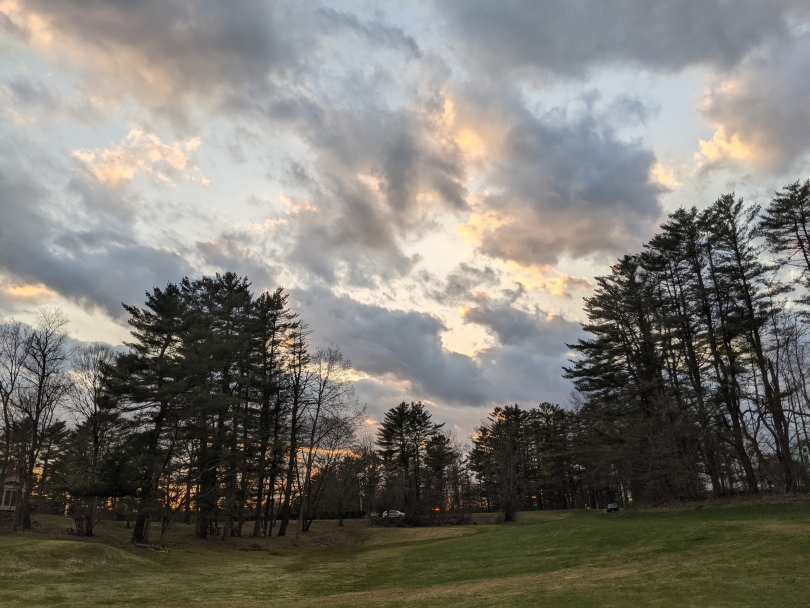 A beautiful spring day from the golf course looking at scattered clouds under the sun! 