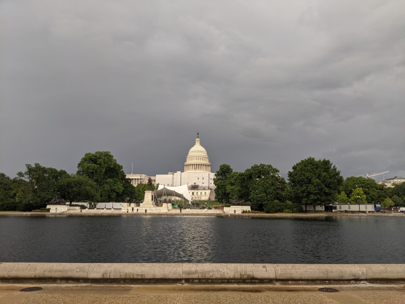 Dark and ominous clouds behind the U.S. Capitol building 