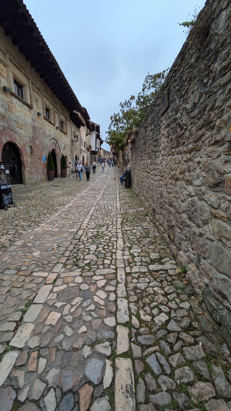 This is a picture of the street in Santillana del Mar, a medieval town in the Cantabria region of Spain.