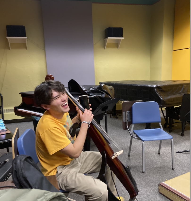 The cellist laughing with his bandmates! The cellist laughing with his bandmates!