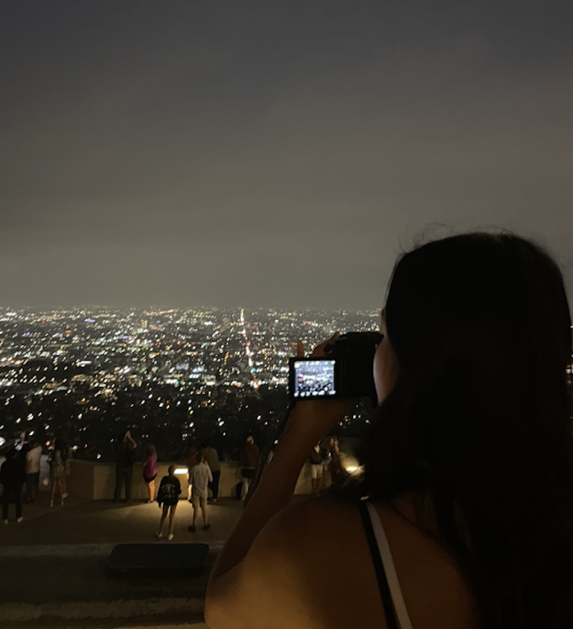 Madison photographing the cityscape
