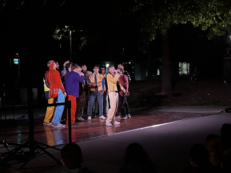 The Dartmouth Aires singing at night for the orientation showcase