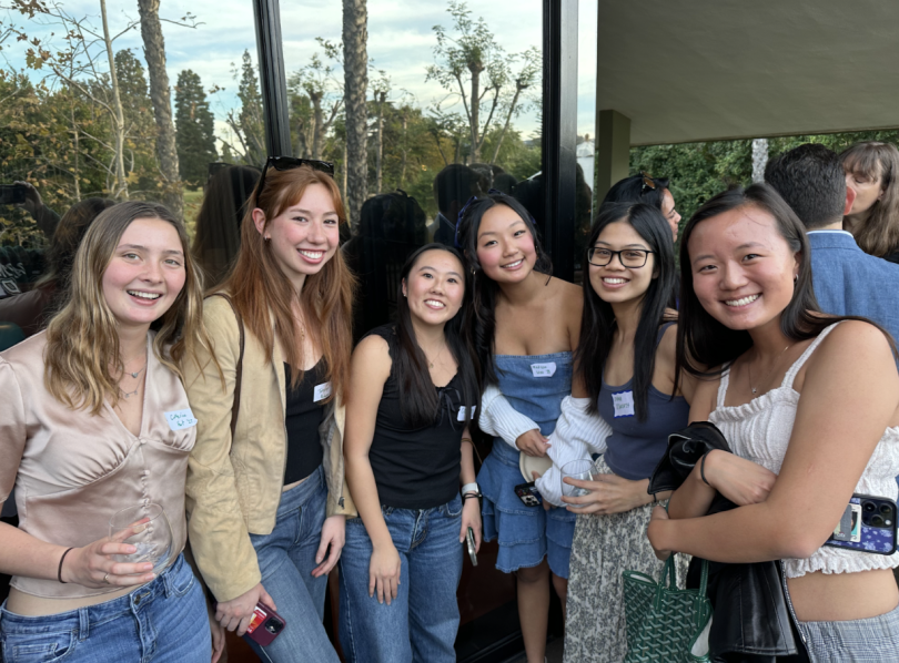 My sister Sydney, her friend Diana, and several '27s posing for a photo