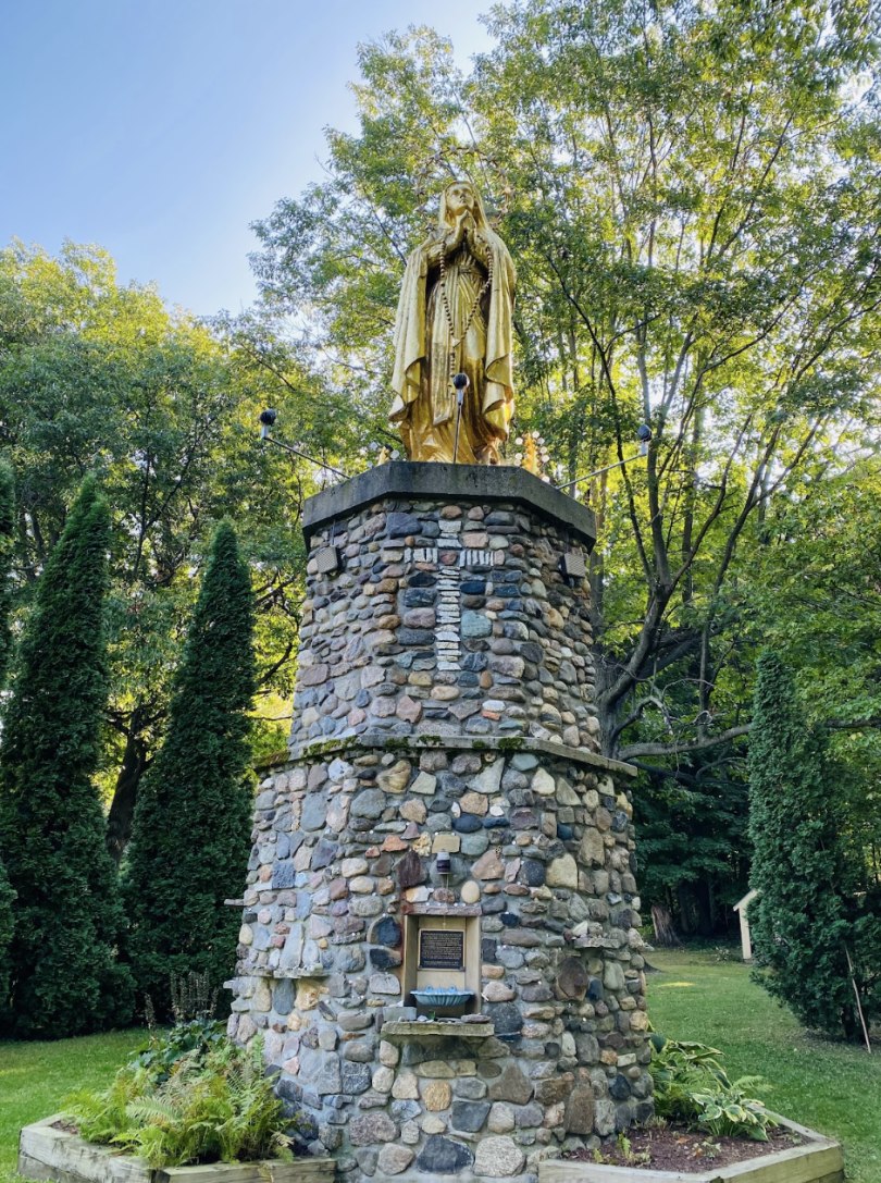 Golden statue of Our Lady at Saint Anne's Shrine.
