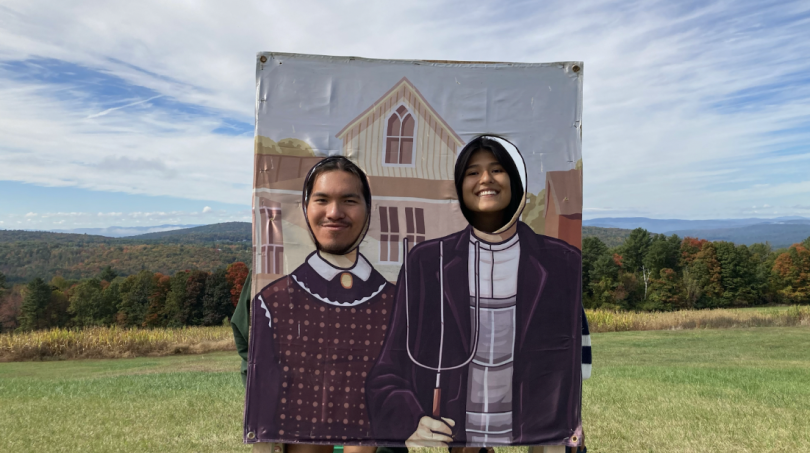 Wica and Hannah pose in a photo opportunity inspired by the painting "American Gothic" by Grant Wood