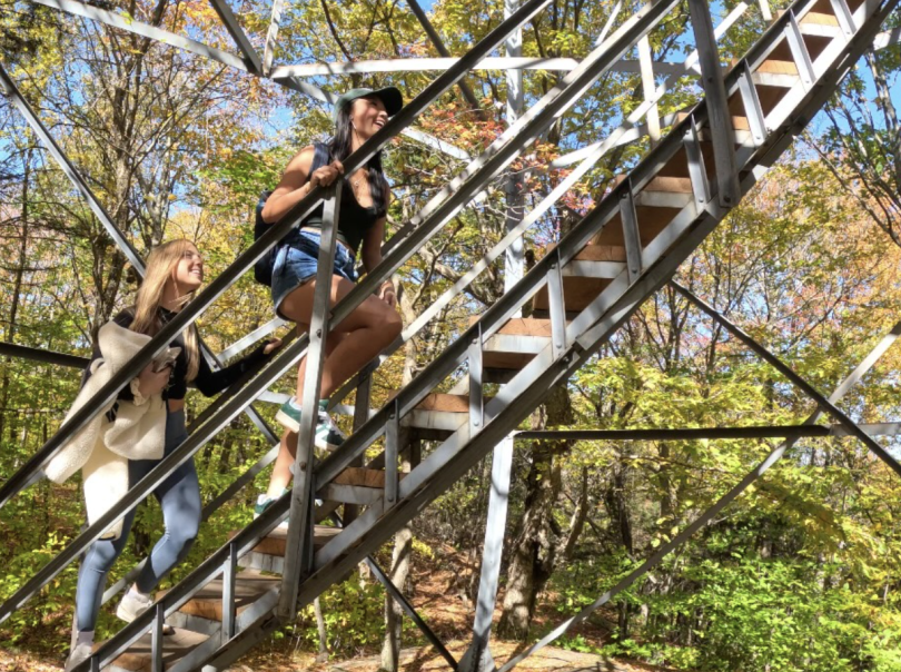 A photo of Emmie and me starting to climb the tower.