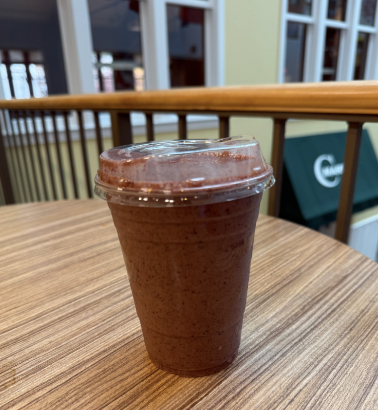  A smoothie on a wooden table.