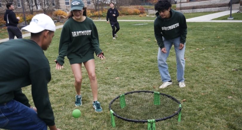 My friends playing spike ball at the tailgate.