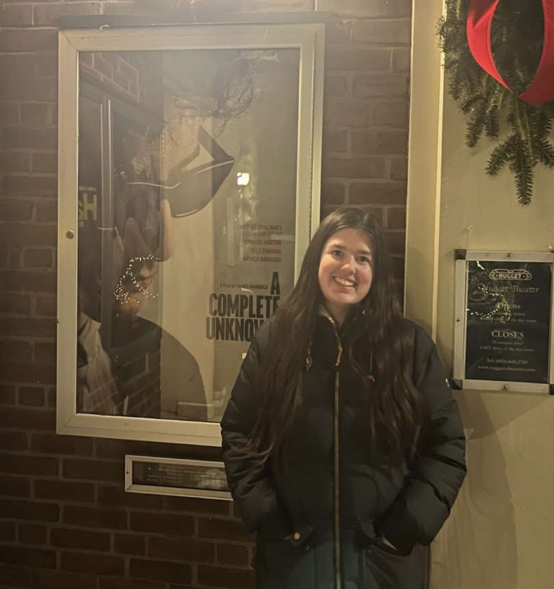 Me in front of the A Complete Unknown poster!