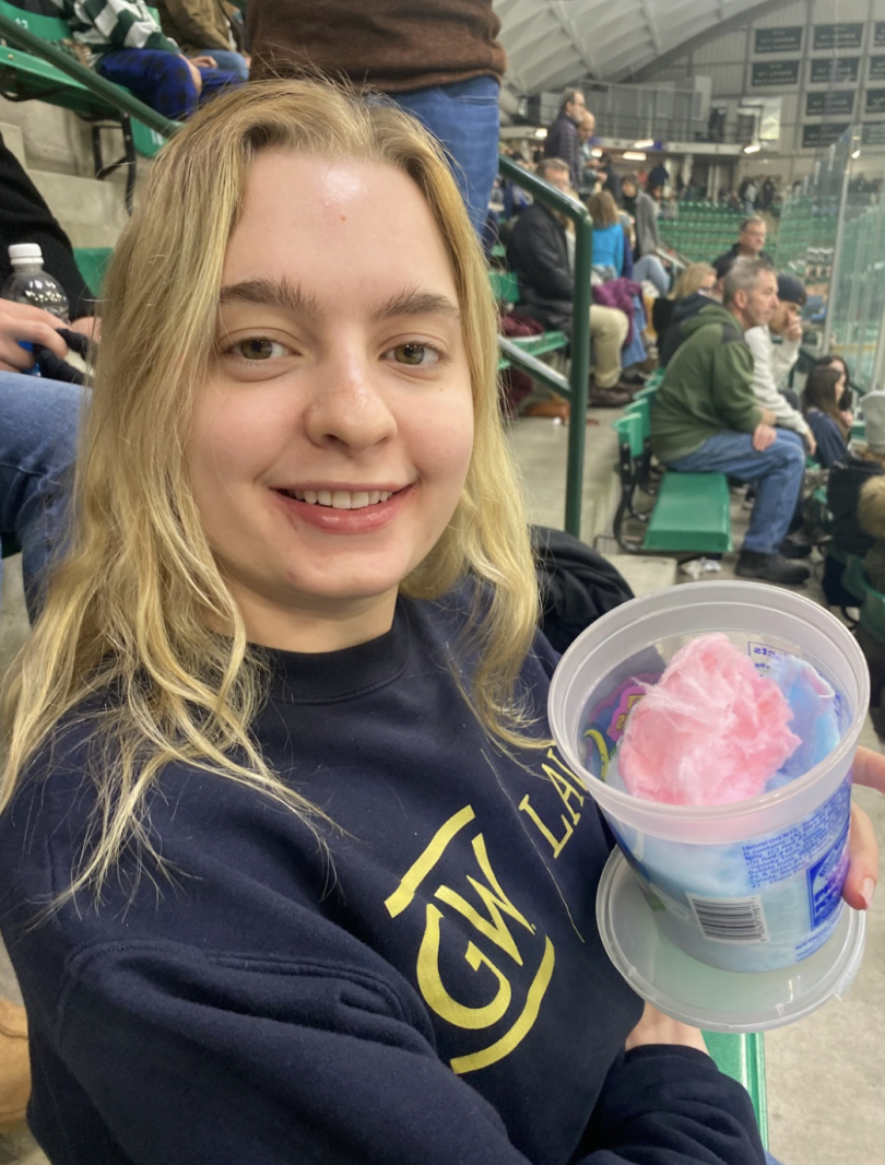 Girl eating cotton candy