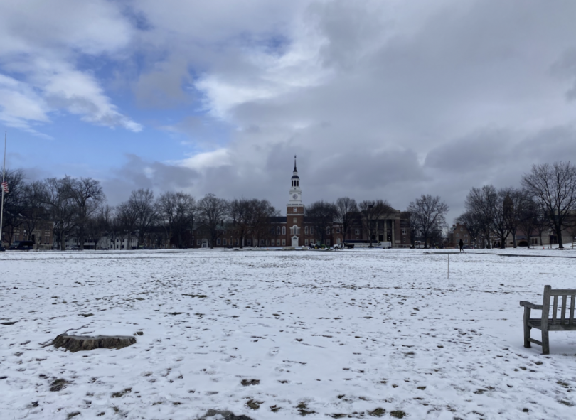 Berry Tower, depicted behind the snow-covered Dartmouth Green