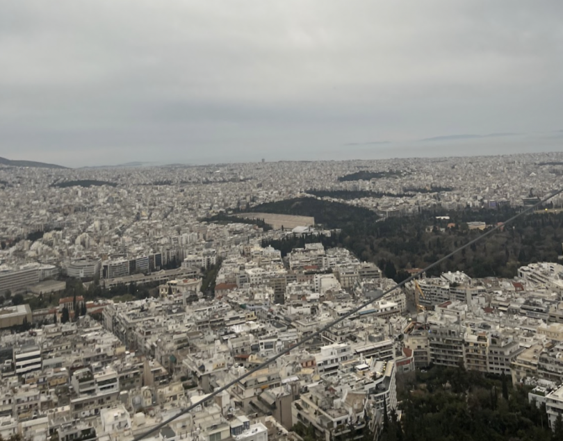 A grey day with white sprawling buildings