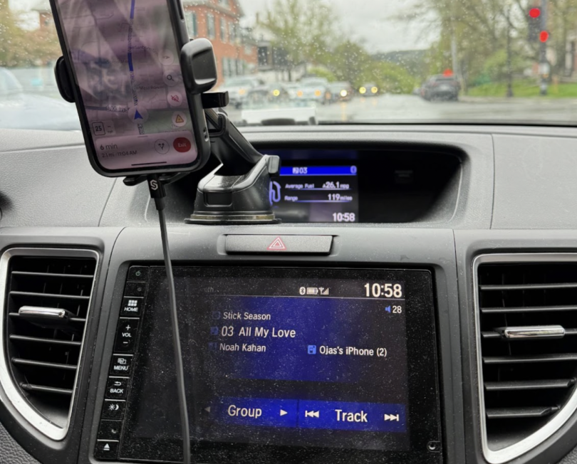 A screen displaying a song being played: "All My Love" from Noah Kahan
