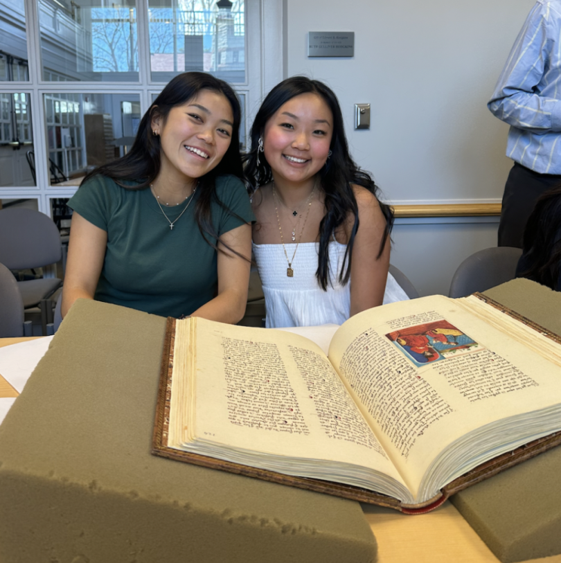 My friend and I flipping through a rare edition of Don Quixote in the Rauner Library.