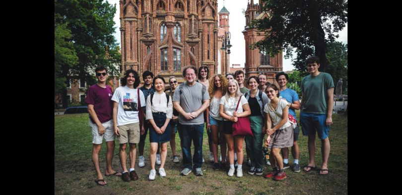 The Baltic LEAP crew in front of a gothic structure in Vilnius, Lithuania