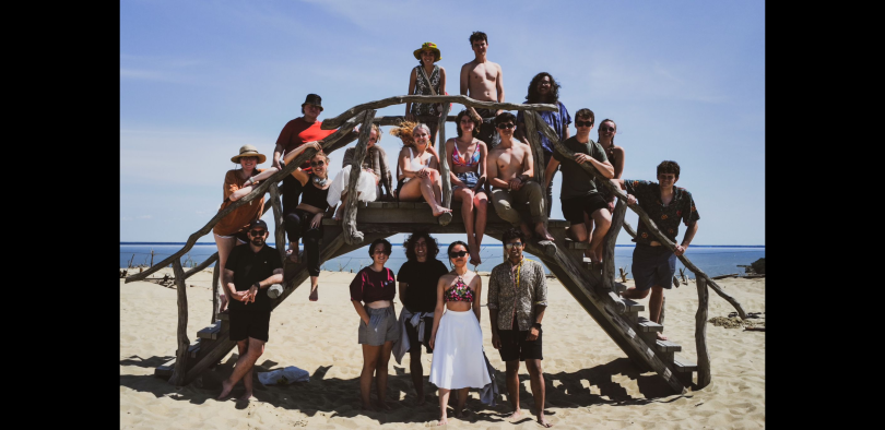Picture of the Baltic LEAP crew in front of a beach in Klaipeda, Lithuania on a wooden structure