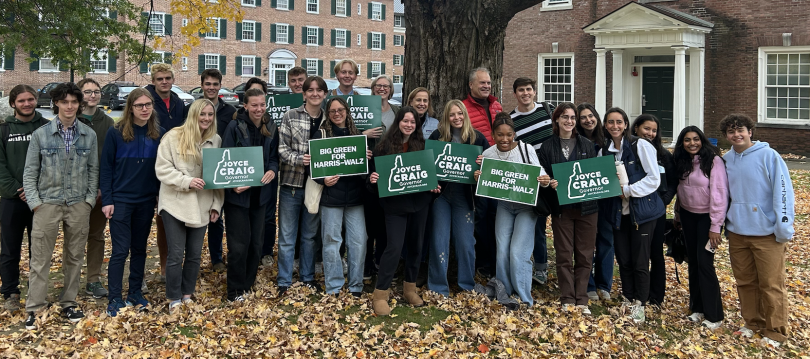 Students hold political signs