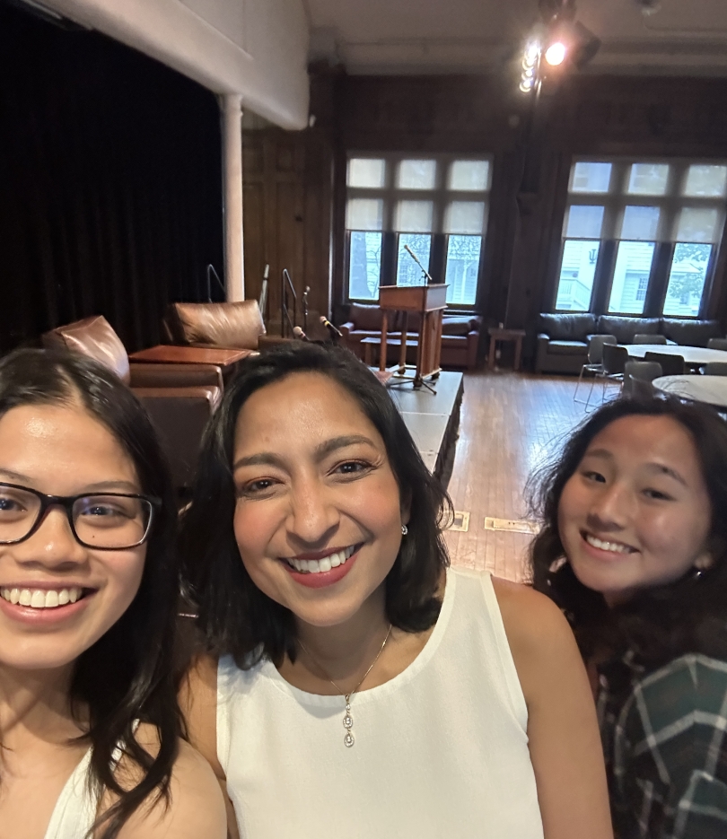 Diana (left) and Emily (right) taking a selfie with Priya (middle) in Collis