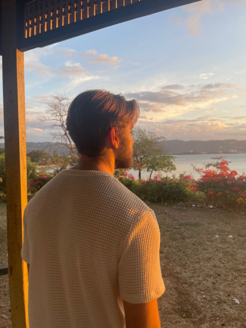 A photo of me looking into the sunset in Jamaica