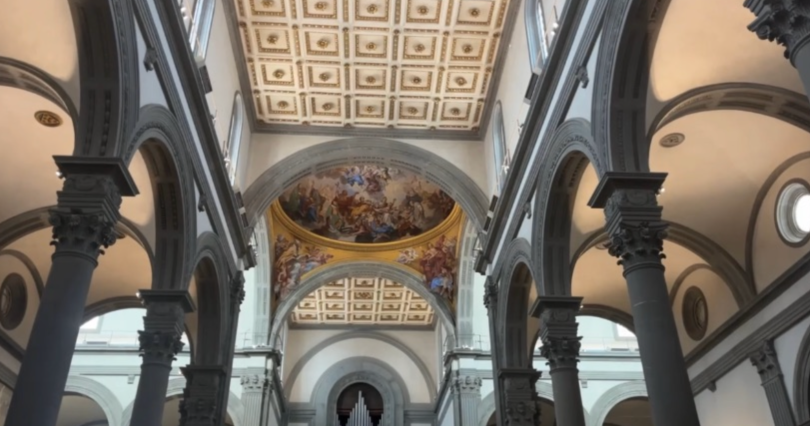 Photo of the roof of San Basilica of San Lorenzo emphasizing the harmony between the minimal use of extravagant color, squares, and colors.