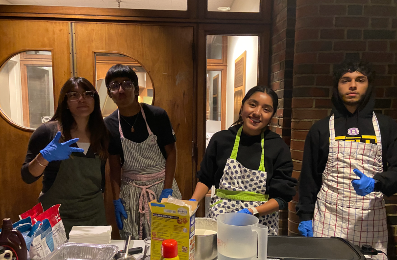 4 students making pancakes