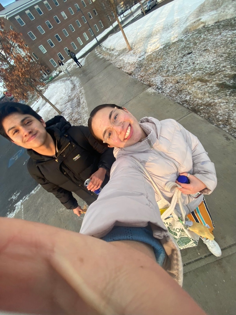 Photo of my friend and I walking into our final for Economics 01.