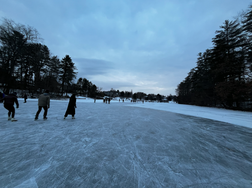 an image of Occom Pond ice skaters 