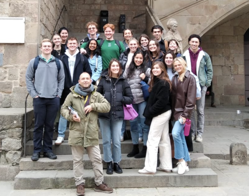 a group of students pose for a photo