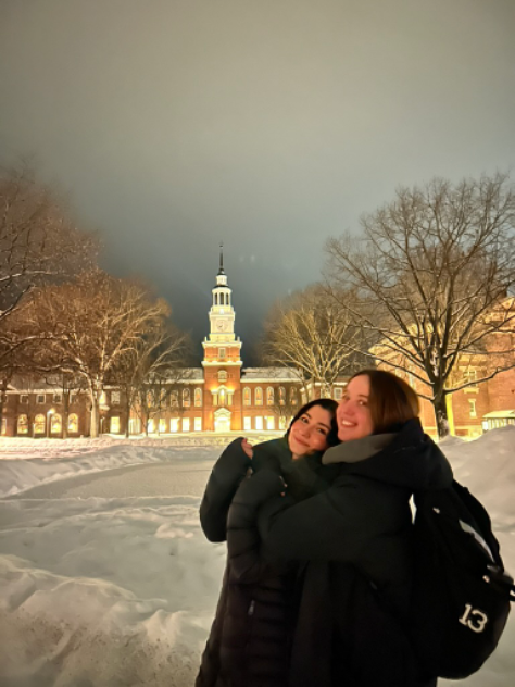 two people in front of Baker Tower