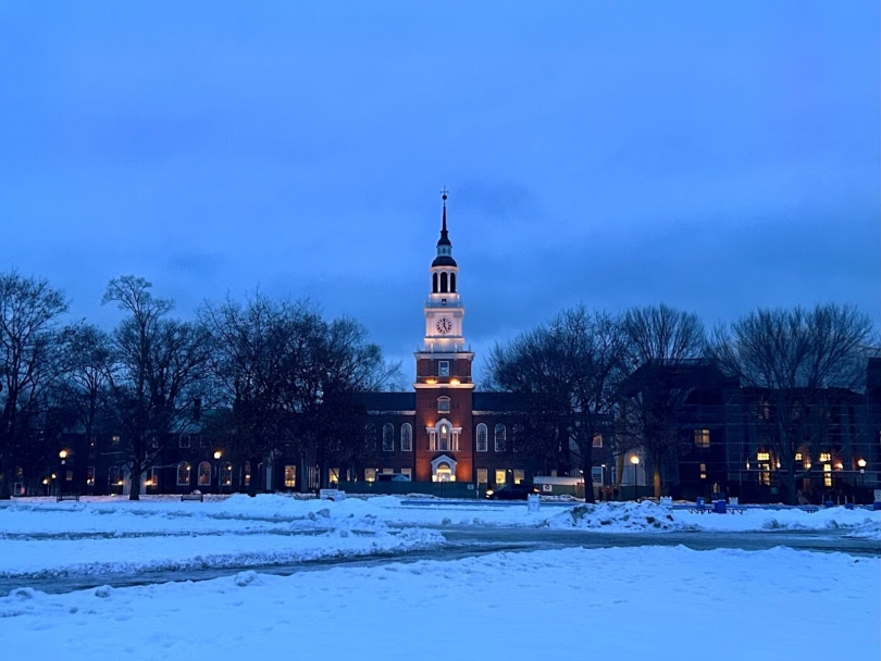 Front view of Baker-Berry Library at a winter night