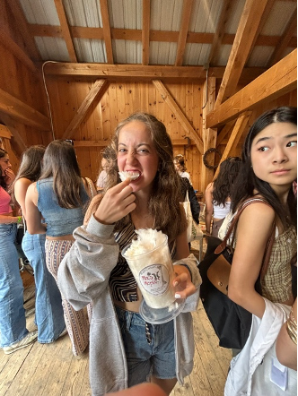 a girl eating cotton candy