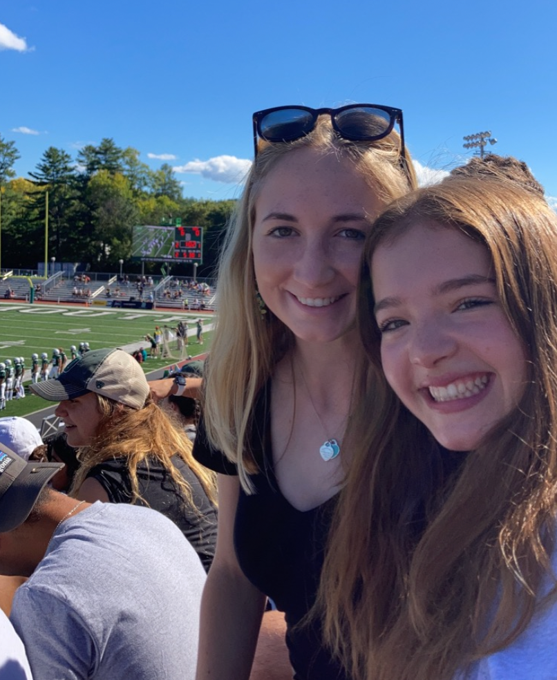 two girls at a football game