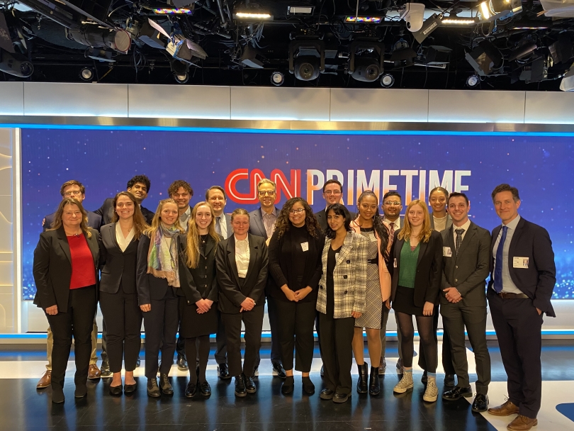 Fellows pose with Jake Tapper '91 in CNN studio