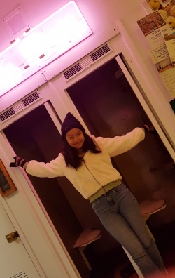 layered student posing in her jacket