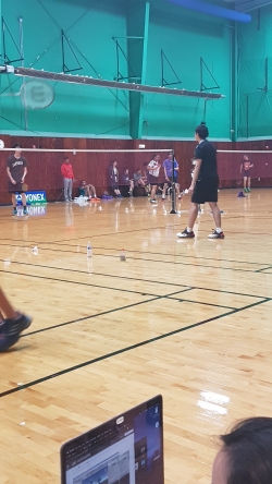 A Dartmouth student at a badminton competition