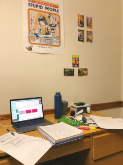 My desk with my computer and biology notes.