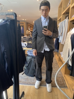 Nick trying on suits